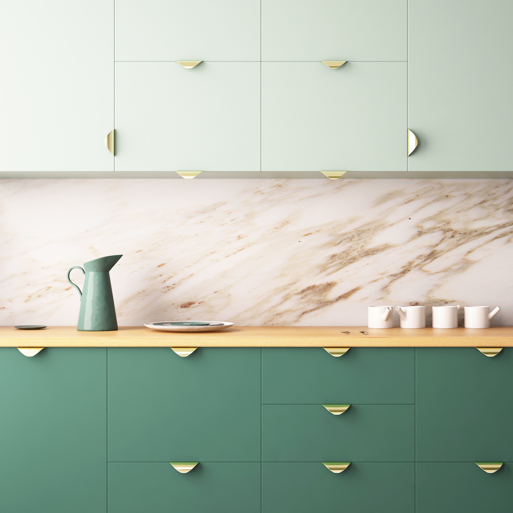 Beautiful, modern kitchen with green cabinetry.